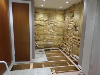 Insulation and plumbing works around shower area